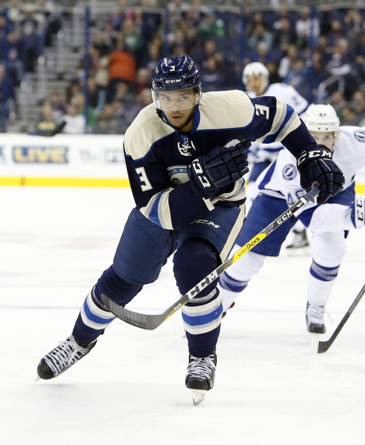 FILE - In this March 13, 2016, file photo, Columbus Blue Jackets&#039; Seth Jones plays against the Tampa Bay Lightning during an NHL hockey game in Columbus, Ohio. The Blue Jackets have signed defenseman Seth Jones to a $32.4 million, six-year contract, Wednesday, June 29, 2016.