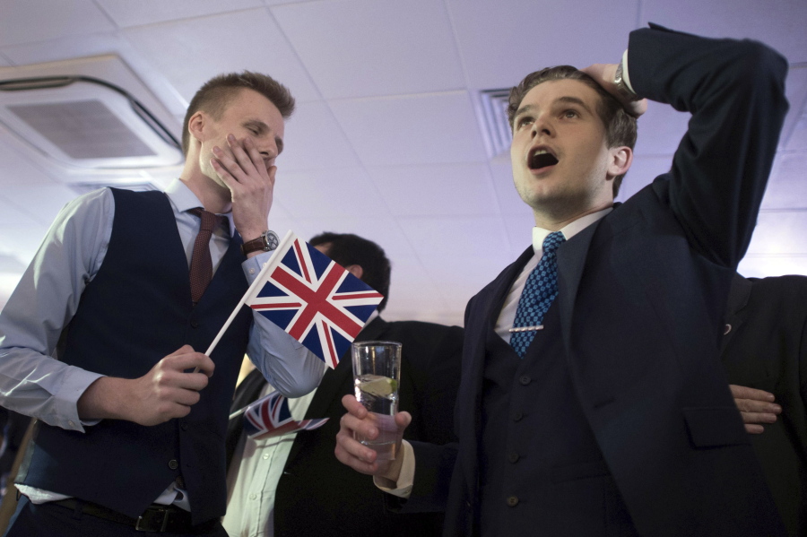 Supporters of leaving the European Union watch results come in from around the country early Friday at a party hosted by Leave.EU in central London.