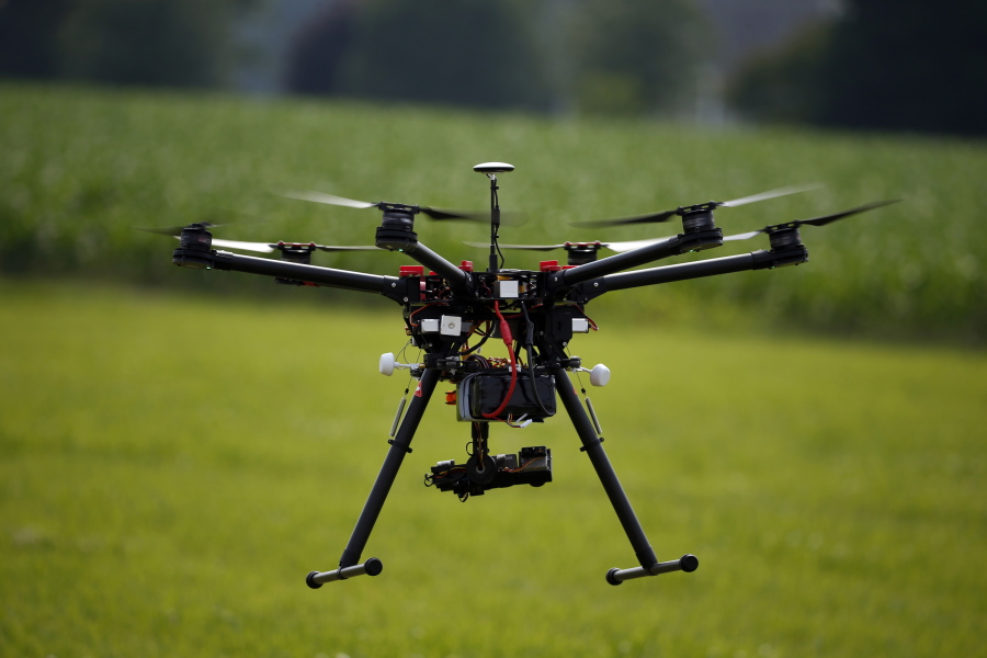 A hexacopter drone is flown during a drone demonstration at a farm and winery on potential use for board members of the National Corn Growers on June 11in Cordova, Md.