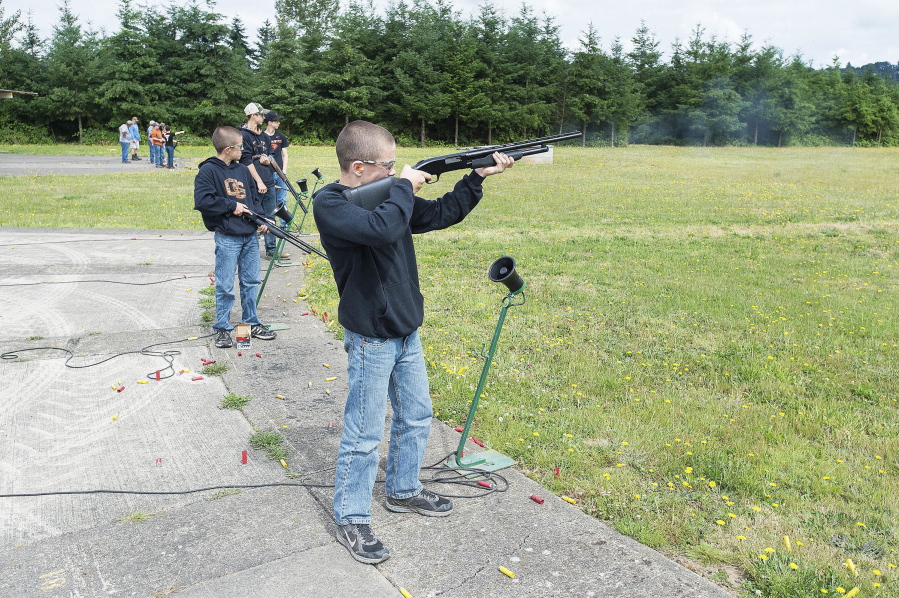 Cougar Friesen takes his turn at clay pigeon shooting practice during kids&#039; shooting day at the Newberg Rod and Gun Club in Newberg, Ore. The 70-year old organization has shifted toward a more family friendly atmosphere, boosting membership and revenue.