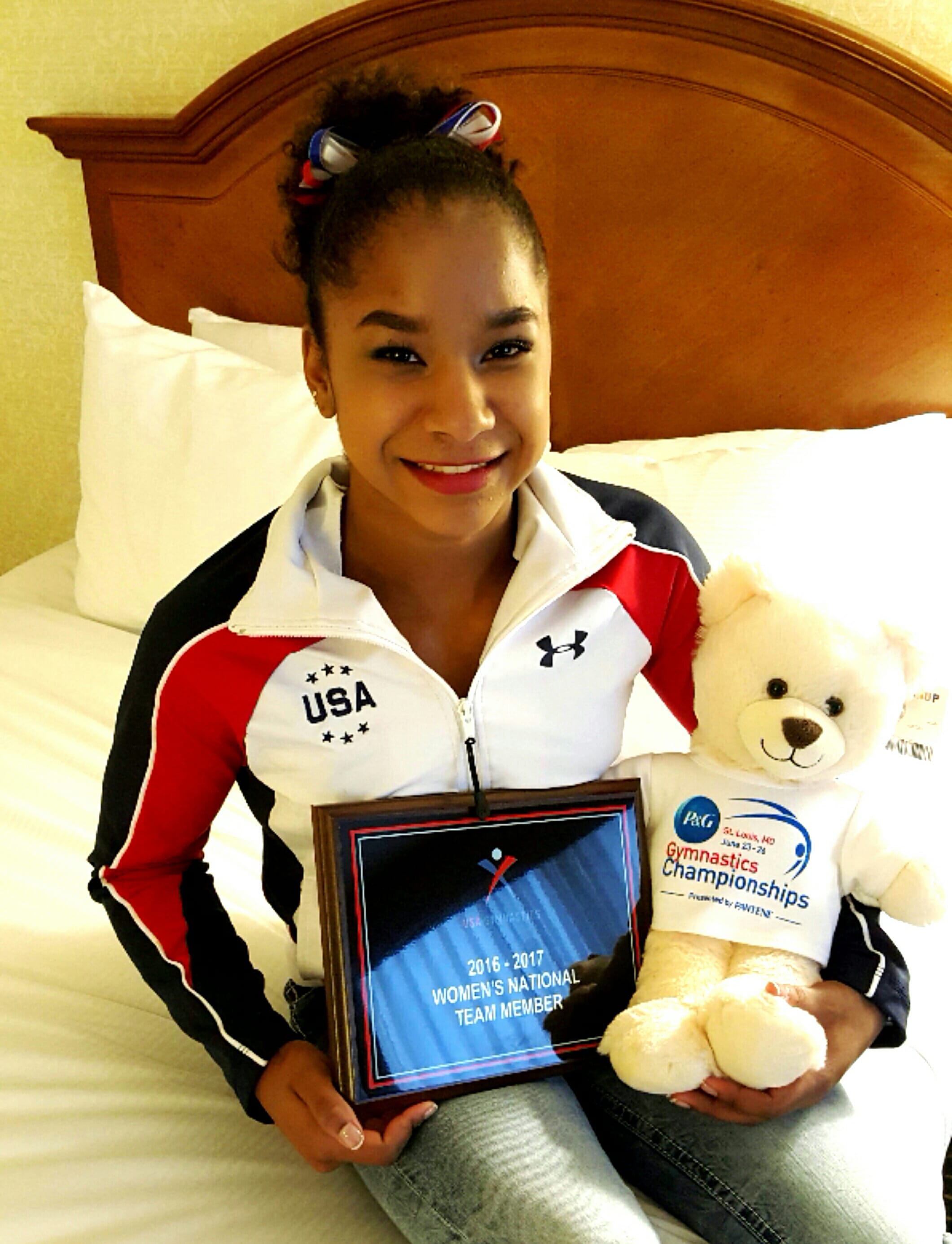 Vancouver's Jordan Chiles shows her awards for making the 2016 USA Junior National gymnastics team.