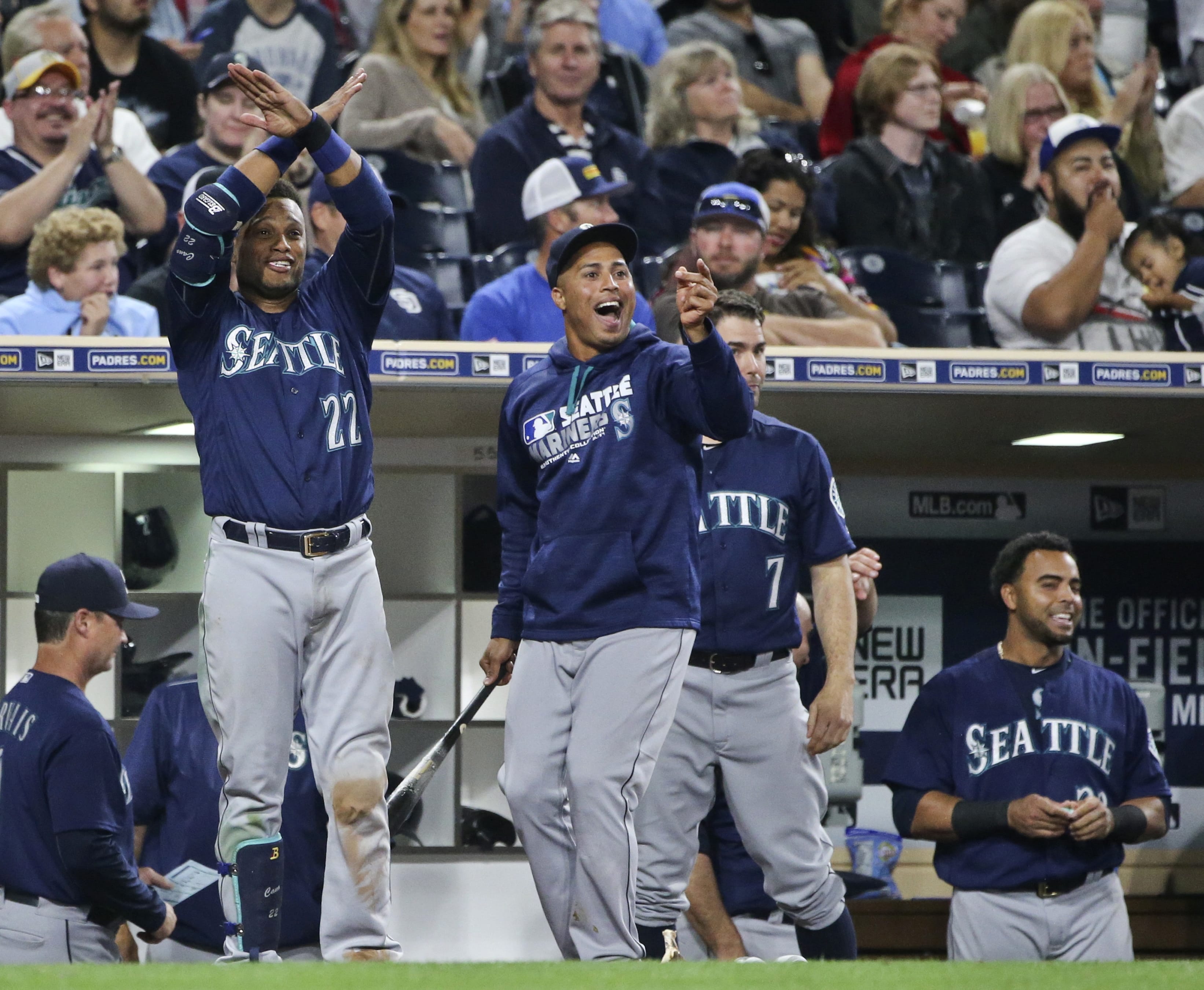 Seattle Mariners' Robinson Cano, Leonys Martin, Seth Smith, and Nelson Cruz, from left,  celebrate during the seventh inning against the San Diego Padres in a baseball game Thursday, June 2, 2016, in San Diego. The Mariners scored nine runs in the inning.