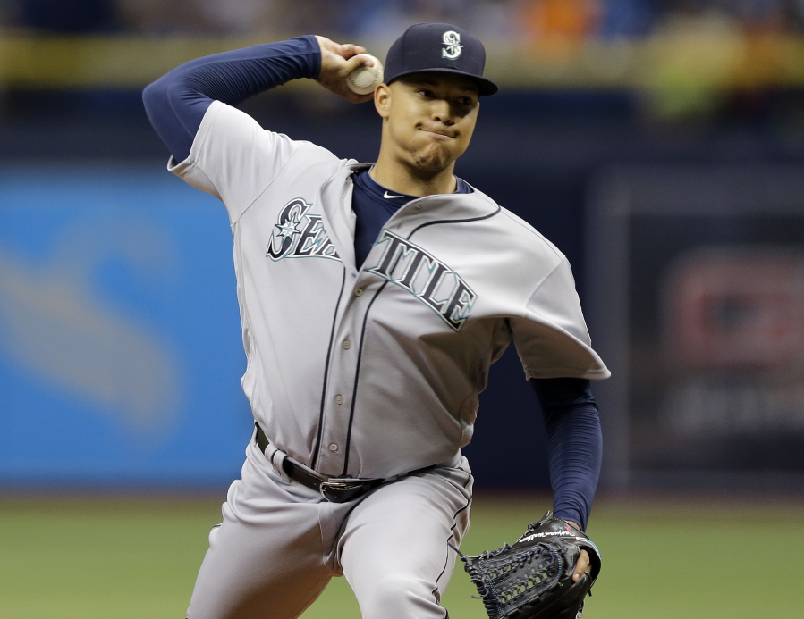 Seattle Mariners&#039; Taijuan Walker pitches to the Tampa Bay Rays during the first inning of a baseball game Tuesday (Chris O&#039;Meara/Associated Press)