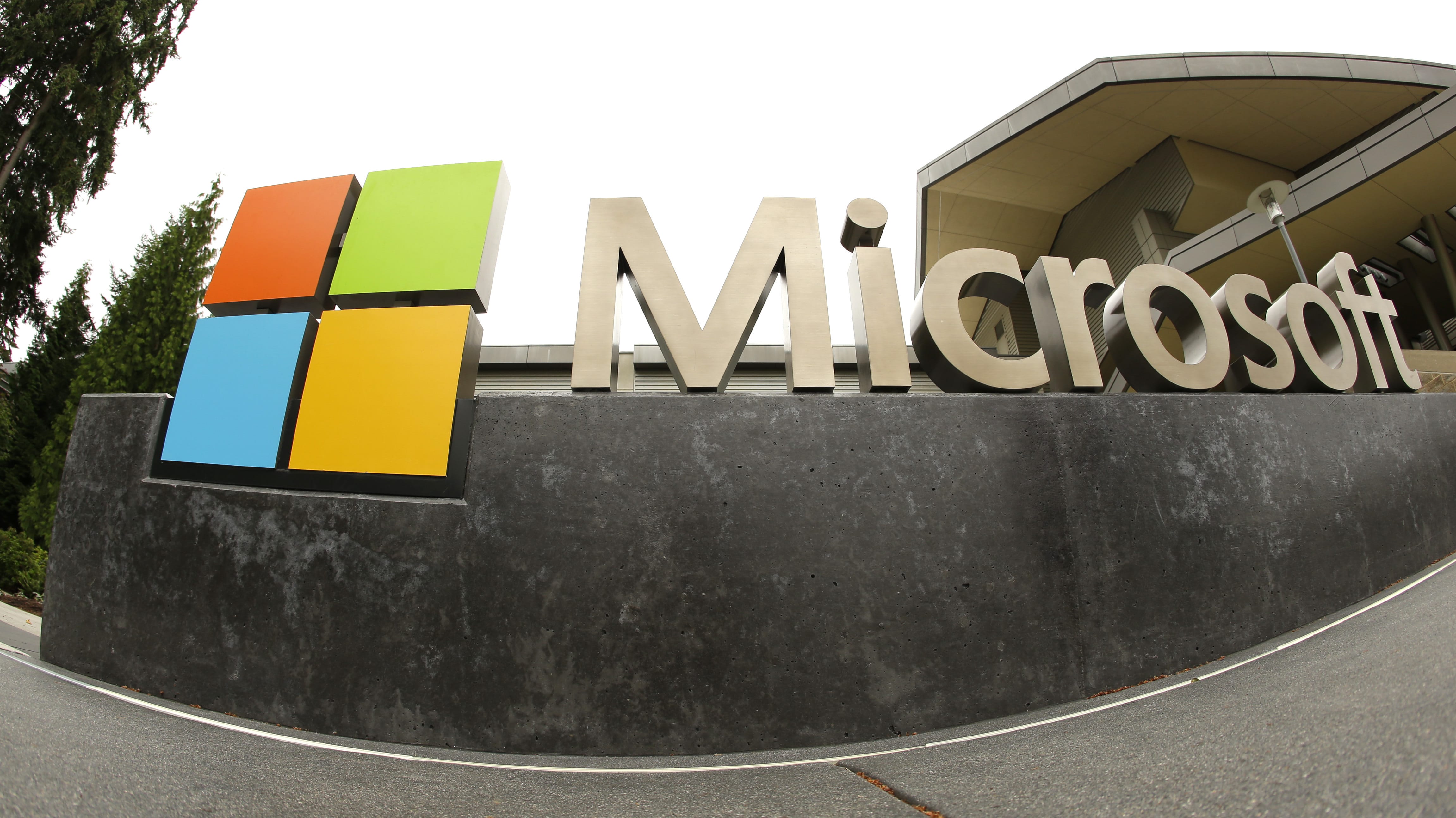 The Microsoft Corp. logo outside the Microsoft Visitor Center in Redmond, Wash. Microsoft said Monday, June 13, 2016, it is buying professional networking service site LinkedIn for about $26.2 billion. LinkedIn, based in Mountain View, Calif., has more than 430 million members. (AP Photo Ted S.