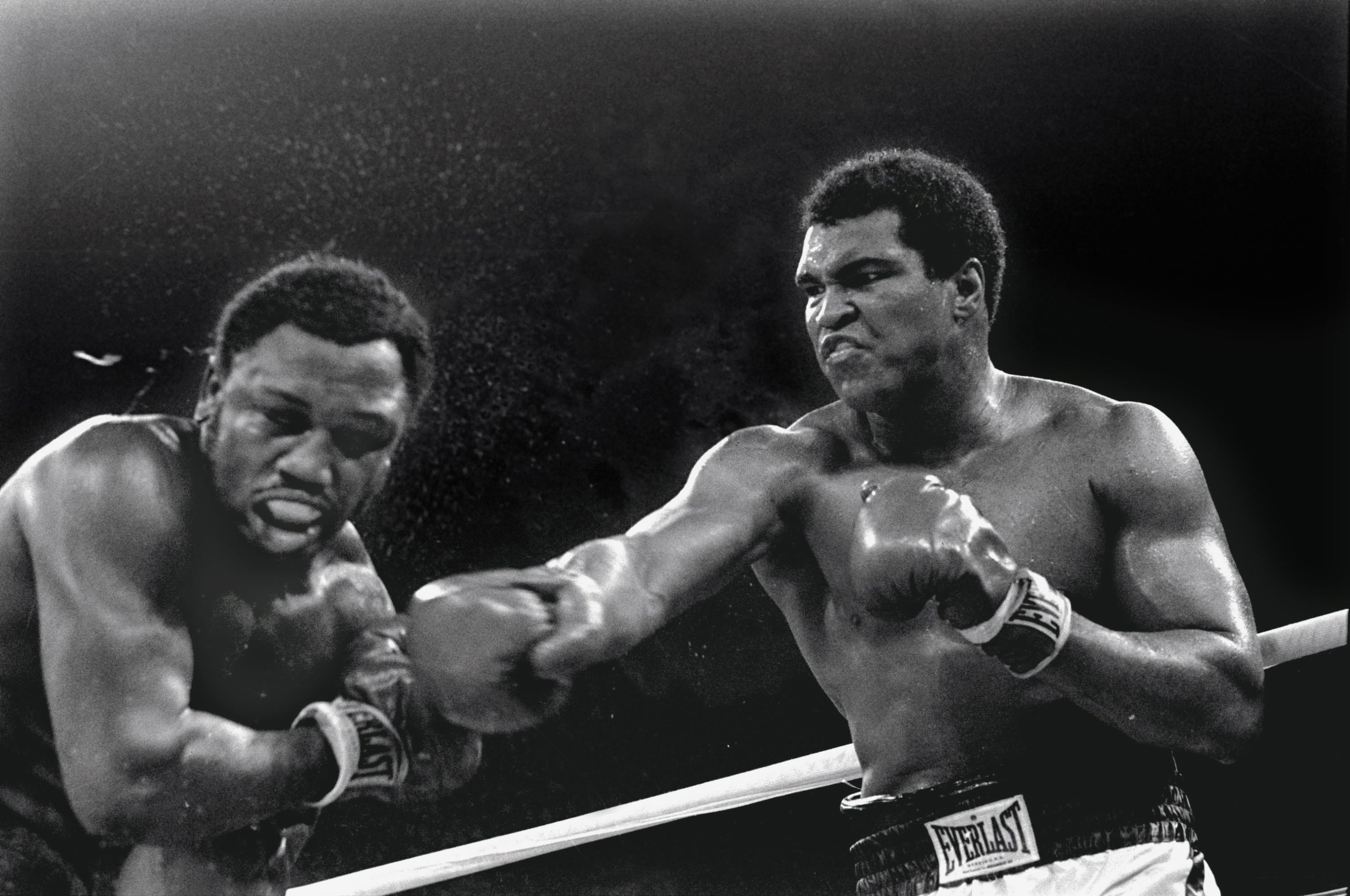 Heavyweight champion Muhammad Ali connects with a right against challenger Joe Frazier in the ninth round of their title fight in Manila, Philippines, on Oct. 1, 1975. Ali won the fight on a decision to retain the title. Ali, the magnificent heavyweight champion whose fast fists and irrepressible personality transcended sports and captivated the world, has died according to a statement released by his family Friday, June 3, 2016. He was 74.