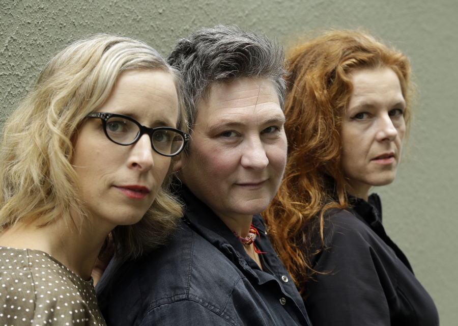 Laura Veirs, from left, k.d. lang and Neko Case pose for a photo Thursday in Portland. The three singer-songwriters released a new album, &quot;case/lang/veirs,&quot; on Friday.