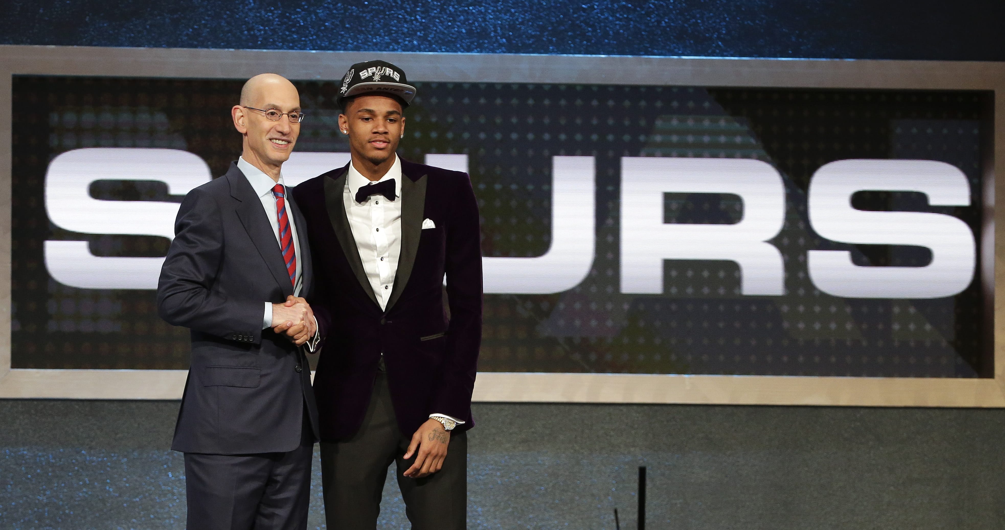 Dejounte Murray poses for a photo with NBA Commissioner Adam Silver after being selected 29th overall by the San Antonio Spurs during the NBA basketball draft, Thursday, June 23, 2016, in New York.