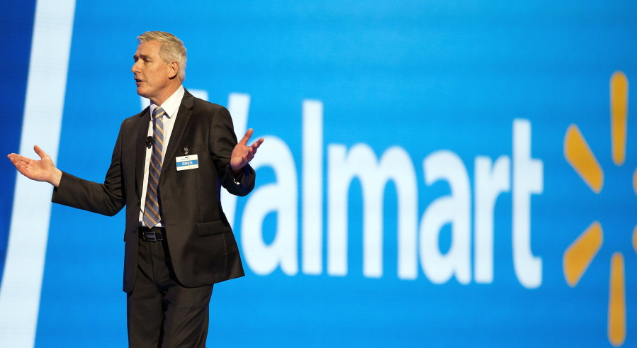 Greg Foran, chief executive officer and president, talks on stage Friday during the annual Wal-Mart shareholders meeting in Fayetteville, Ark.