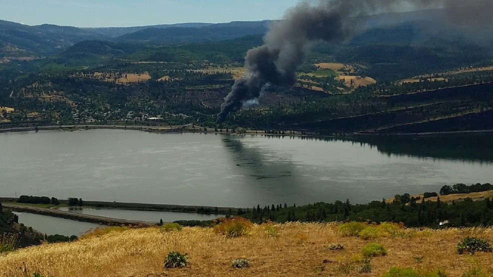 A train fire in the Columbia River Gorge has evacuated schools in the nearby town of Mosier and shut down Interstate 84 between Hood River and The Dalles.