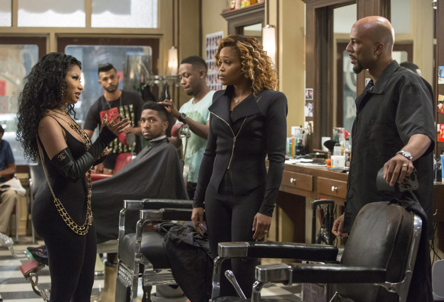 Nicki Minaj, foreground from left, Eve, second from right, and Common, right, star in &quot;Barbershop: The Next Cut.&quot; (Chuck Zlotnick/Warner Bros.)