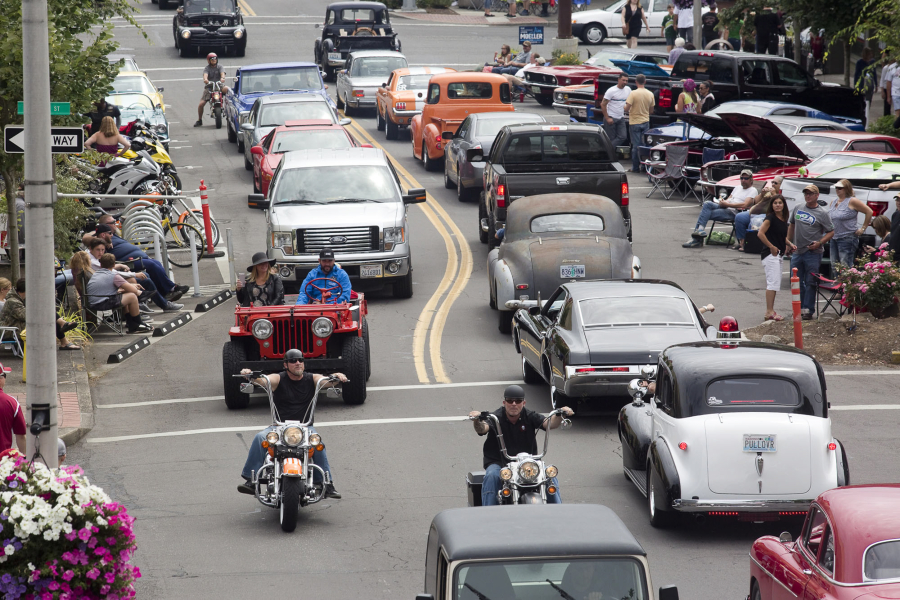 New and vintage cars, and motorcycles move bumper to bumper up and down Main Street in Vancouver during the annual Cruisin' the Gut event.