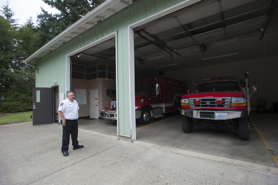 Clark County Fire &amp; Rescue Division Chief of Operations Mike Jackson stands outside Fire District 2&#039;s fire station, which is used for storage since nobody operates out of it at the moment. It was previously used by volunteers who came from the former Woodland Fire Department. District 2 residents will vote on a potential merger with Clark County Fire &amp; Rescue on Aug. 2.