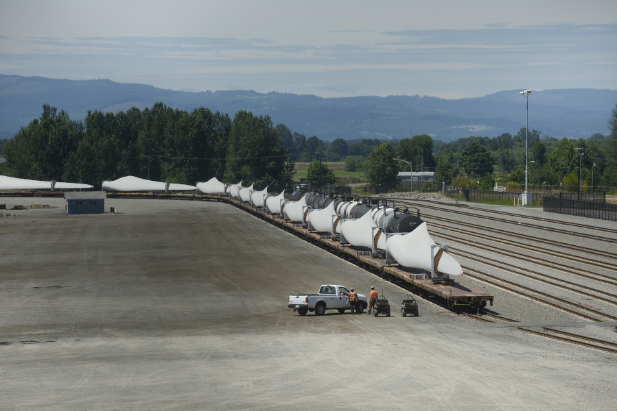 Wind turbines sit on the loop track at the Port of Vancouver&#039;s Terminal 5. Thanks to renewed federal tax incentives, imported wind turbine parts are again making stops at the port en route to wind farms around the country.