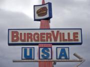 A sign stands over Burgerville on East Mill Plain Boulevard on March 4, 2011.