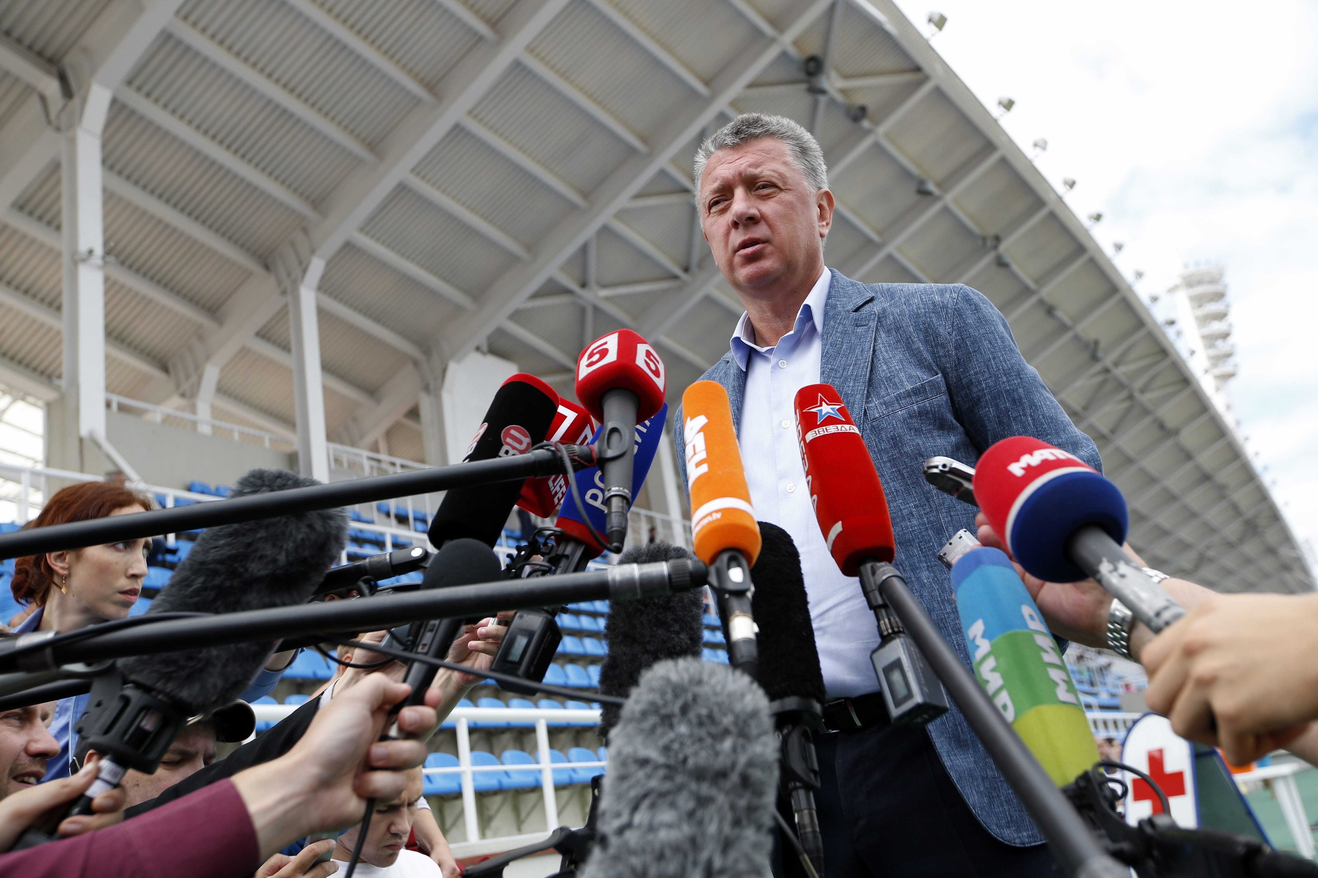 Dmitry Shlyakhtin, head of the Russian track and field federation, speaks to journalists prior to the Russian Athletics Cup, at Zhukovsky, outside Moscow, Russia, Thursday, July 21, 2016. Russia lost its appeal Thursday against the Olympic ban on its track and field athletes, a decision which could add pressure on the IOC to exclude the country entirely from next month's games in Rio de Janeiro.