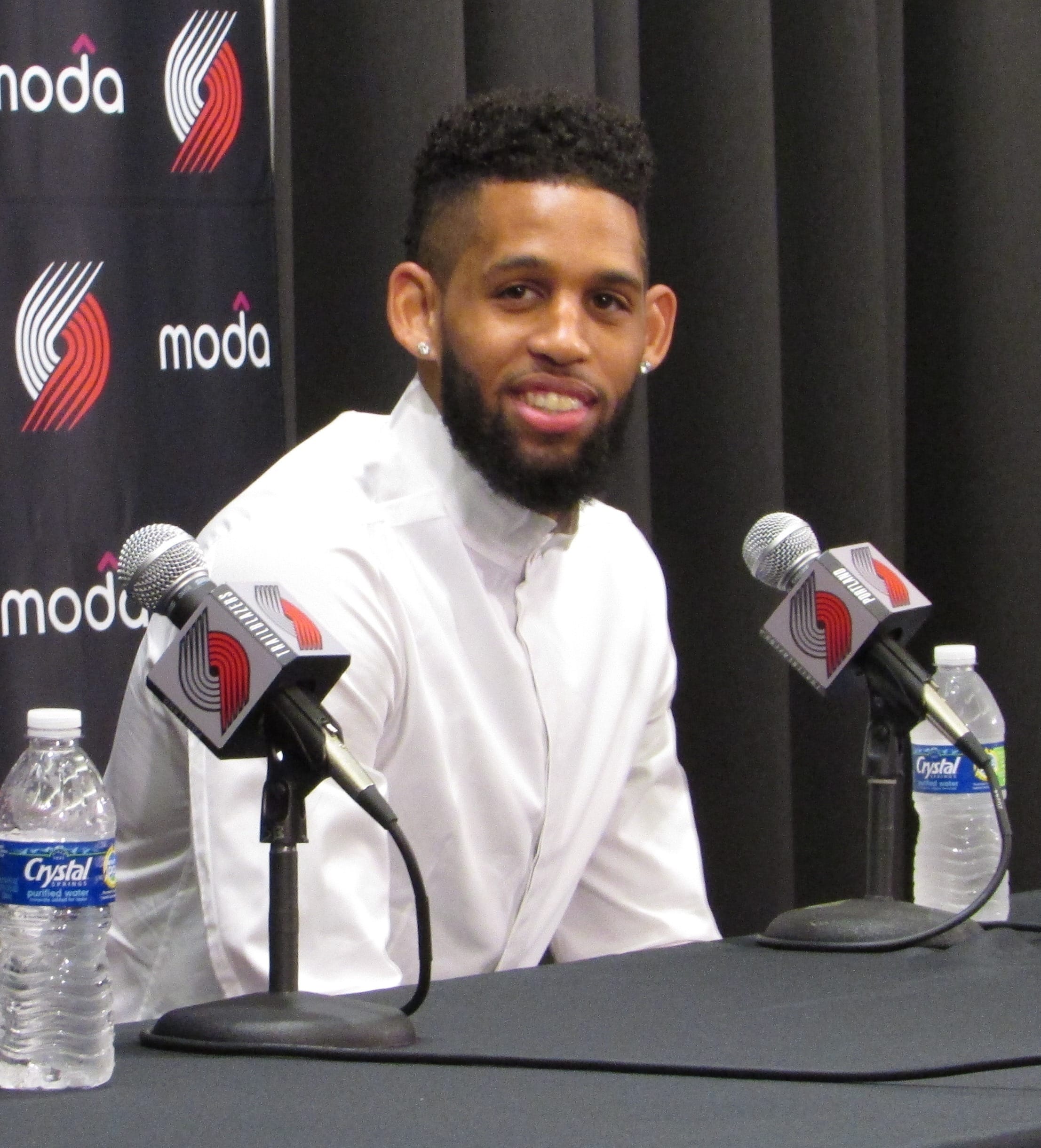 Portland Trail Blazers guard Allen Crabbe discusses his new contract with the team at a news conference at the team's practice facility in Tualatin, Ore., Friday, July 22, 2016. (AP Photo/Anne M.