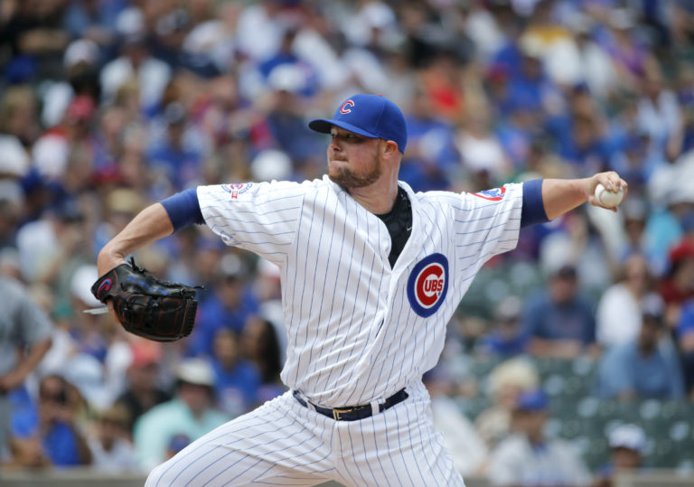 Chicago Cubs starting pitcher Jon Lester delivers during the first inning of a baseball game against the Seattle Mariners Friday, July 29, 2016, in Chicago.