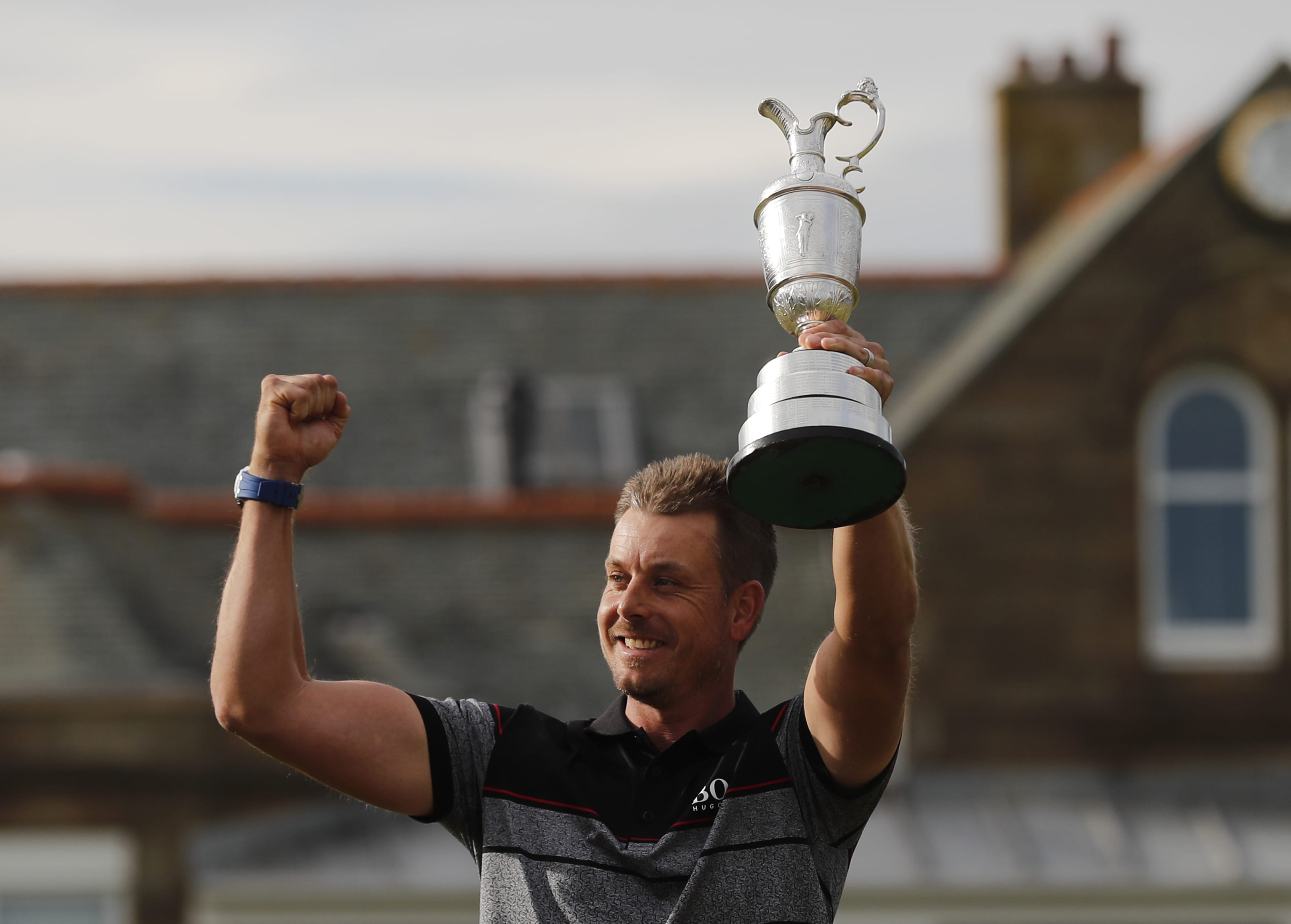 Henrik Stenson of Sweden poses with the trophy after winning the British Open Golf Championships at the Royal Troon Golf Club in Troon, Scotland, Sunday, July 17, 2016.