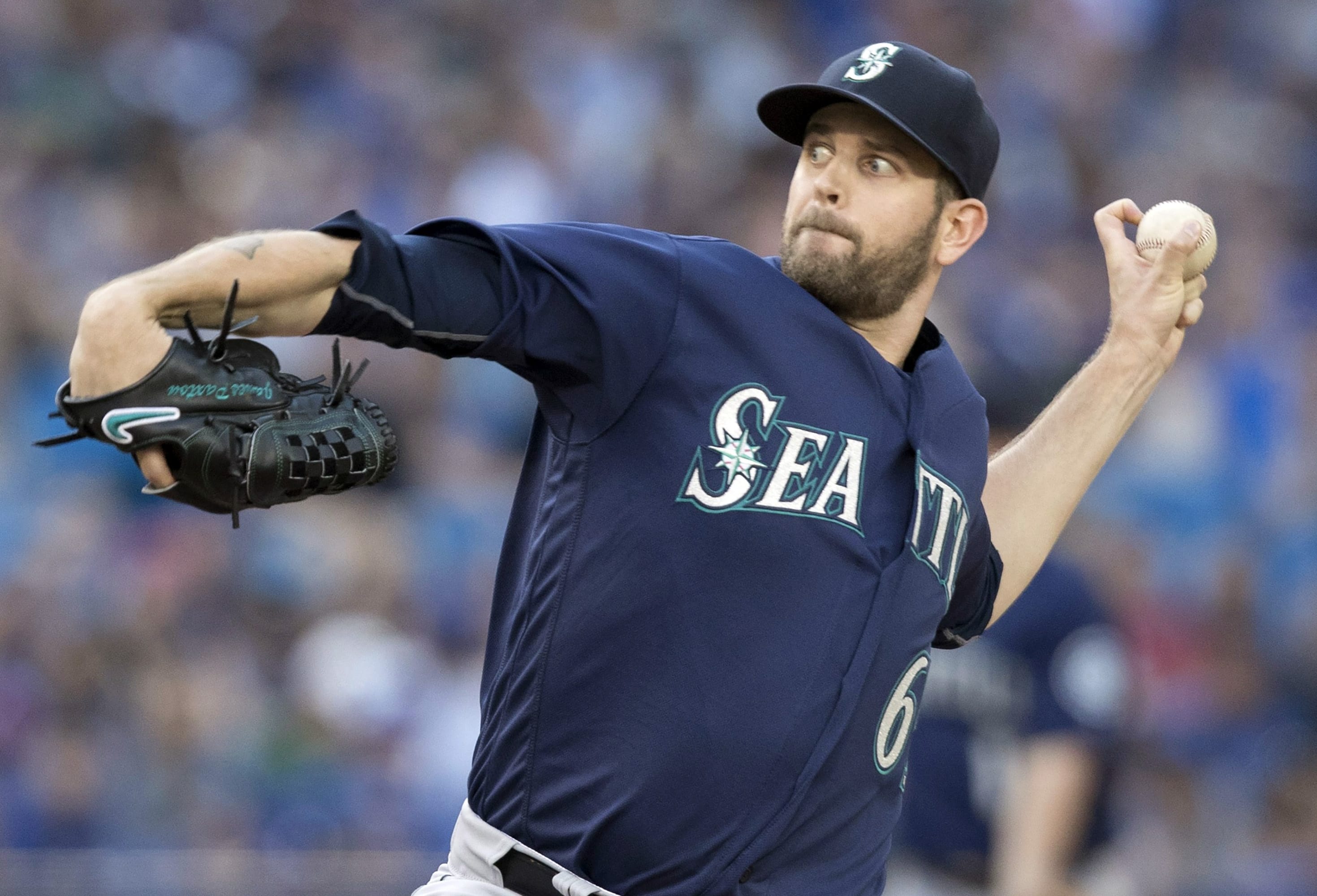 Seattle Mariners starting pitcher James Paxton throws against the Toronto Blue Jays during the first inning of a baseball game in Toronto, Friday, July 22, 2016.