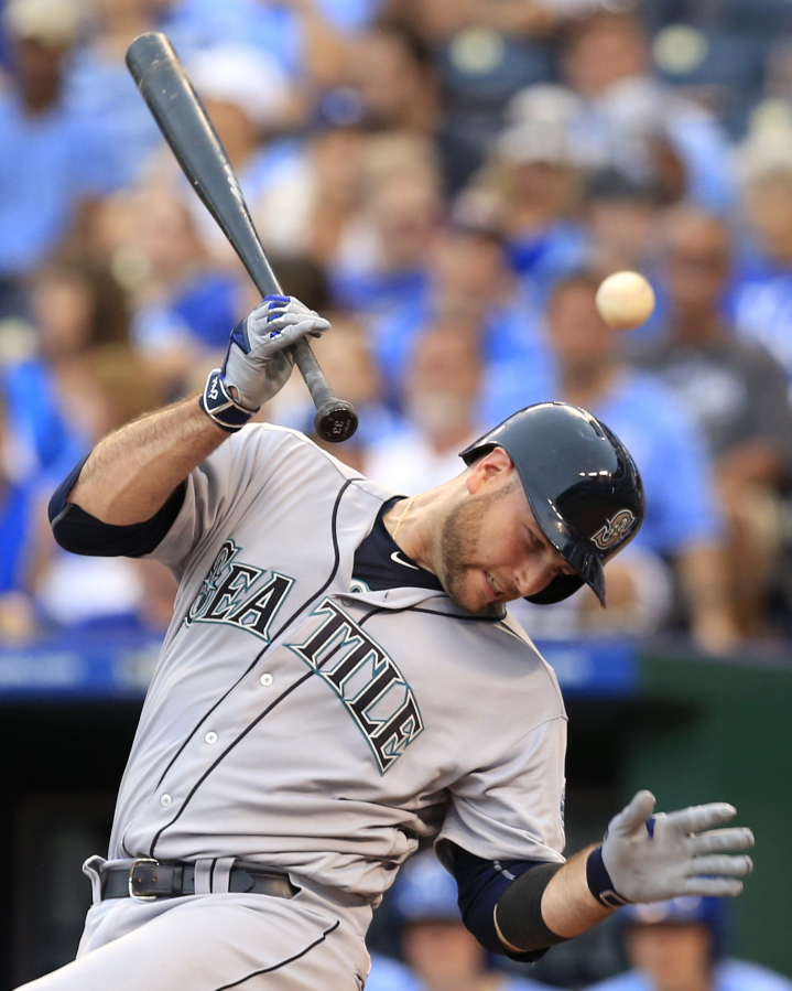 Seattle Mariners catcher Chris Iannetta fouls off an inside pitch by Kansas City Royals reliever Luke Hochevar during the seventh inning of a baseball game at Kauffman Stadium in Kansas City, Mo., Saturday, July 9, 2016.