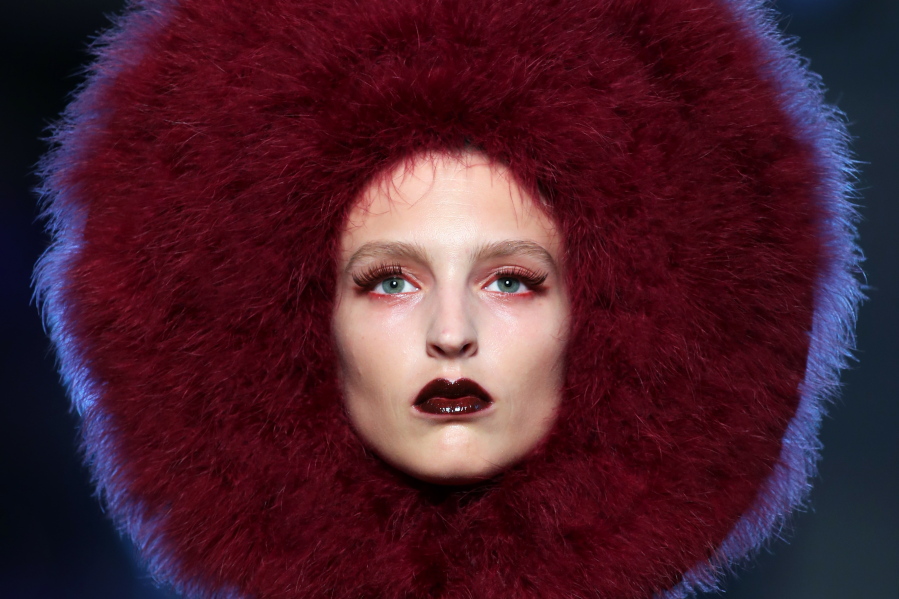 Jean-Paul Gaultier&#039;s Haute Couture Fall-Winter 2016-2017 fashion collection includes face-hugging, furry halos.