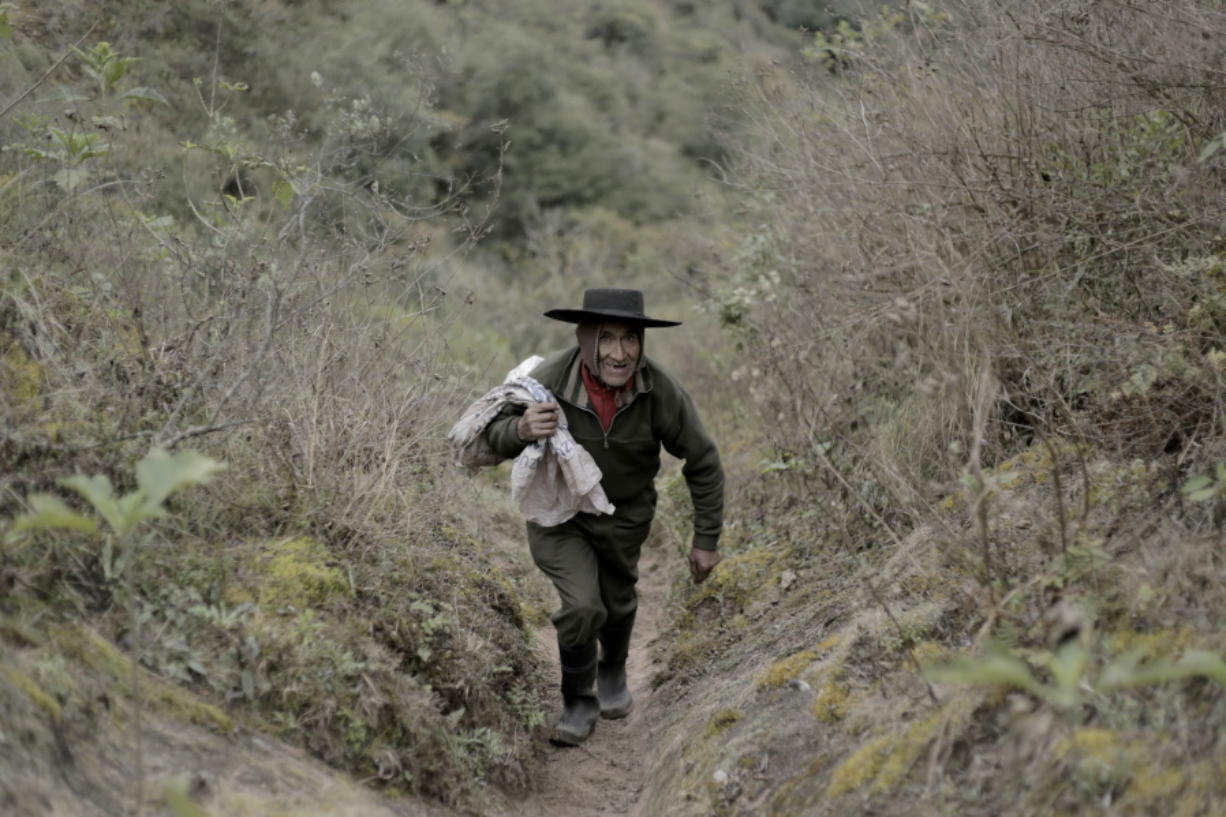Pedro Luca walks down the mountain to San Pedro de Colalao in Argentina&#039;s northern province of Tucuman. He has lived in a cave in northern Argentina for 40 years.