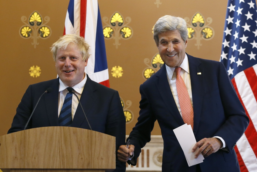 Boris Johnson, new British foreign secretary, left, with U.S.