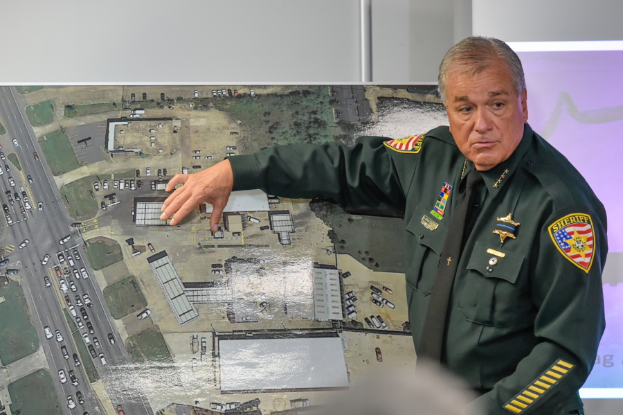 Sheriff Sid Gautreaux explains shooters actions during a news conference regarding the shooting of police officers, in Baton Rouge on Monday. Multiple police officers were killed and wounded Sunday morning in a shooting near a gas station in Baton Rouge, less than two weeks after a black man was shot and killed by police, sparking nightly protests across the city.