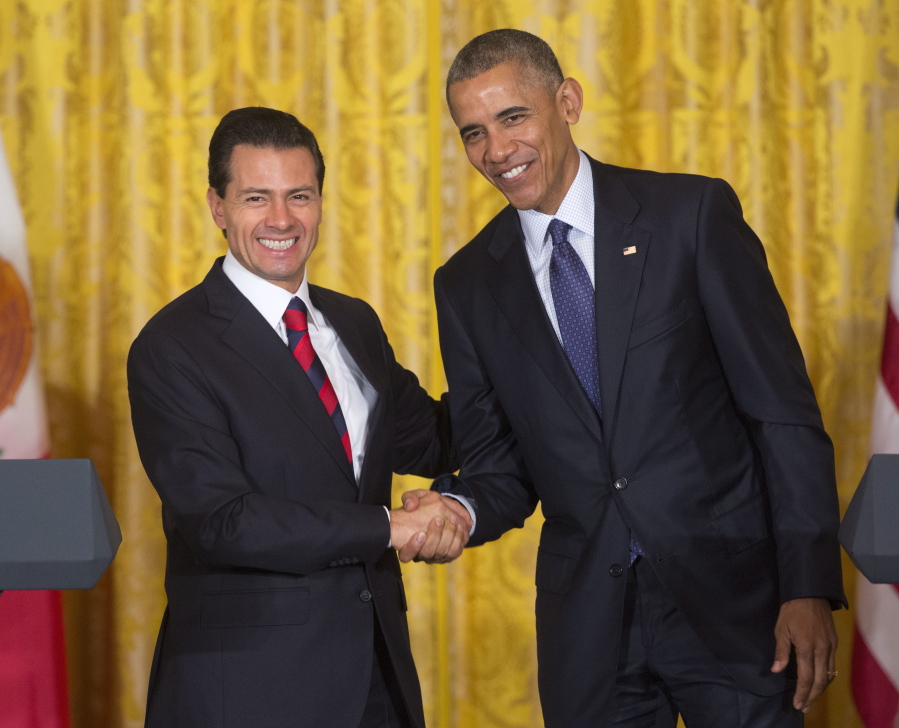 President Barack Obama and Mexican President Enrique Pena Nieto shake hands Friday following their joint news conference in the East Room of the White House in Washington. Obama fiercely rejected Donald Trump&#039;s depiction of an America in crisis on Friday, arguing that violent crime and illegal immigration have plunged under his leadership to their lowest rates in decades.