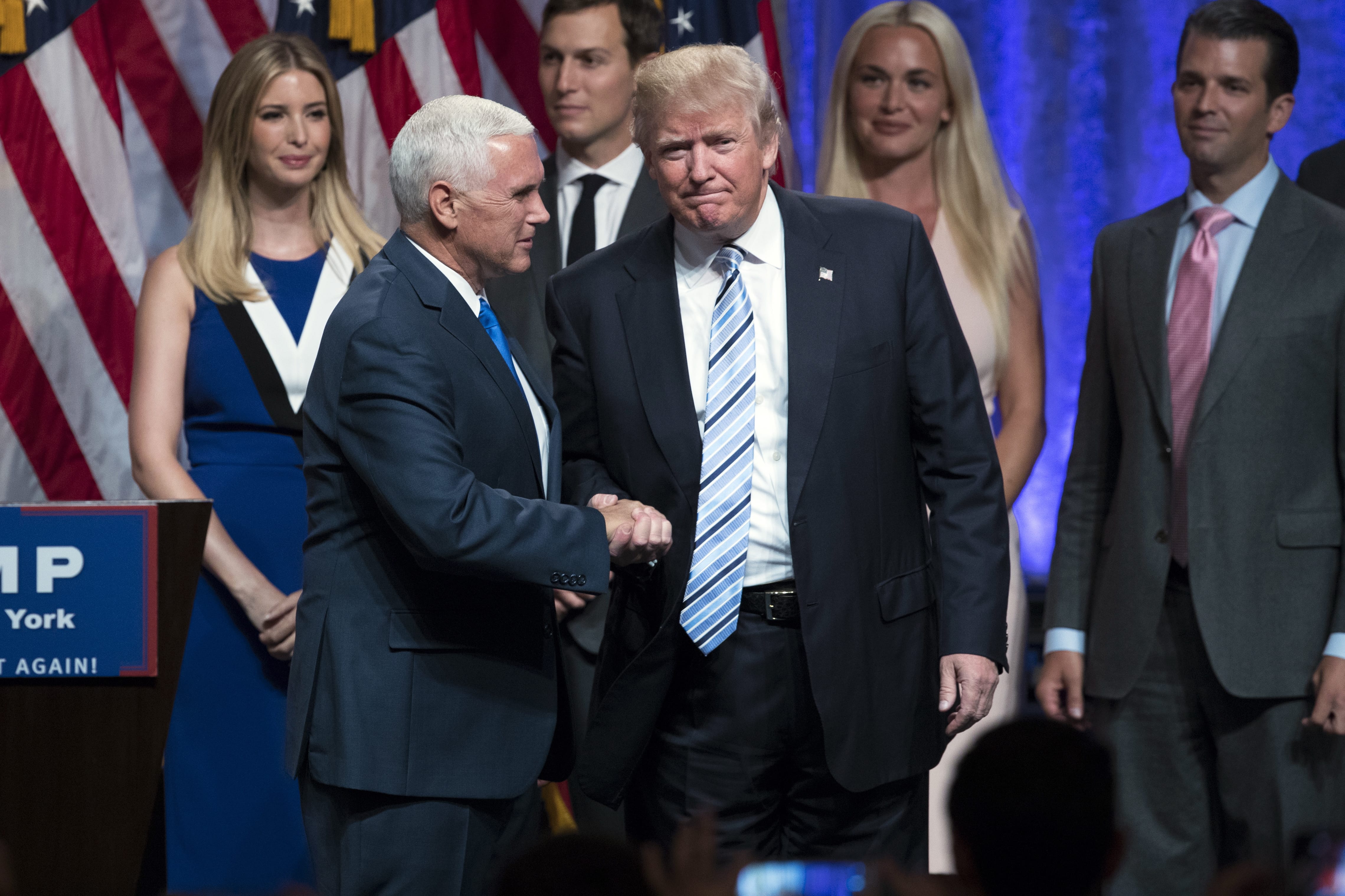 Republican presidential candidate Donald Trump, right, shakes hands with Gov. Mike Pence, R-Ind., during a campaign event to announce Pence as the vice presidential running mate on, Saturday, July 16, 2016, in New York.  Trump introduced Pence calling him "my partner in this campaign" and his first and best choice to join him on a winning Republican presidential ticket.