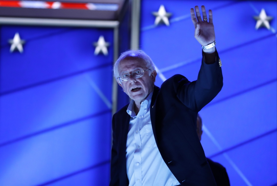 Sen. Bernie Sanders, I-Vt., waves as he walks off the stage after checking out the podium before the start of the first day of the Democratic National Convention in Philadelphia on Monday.
