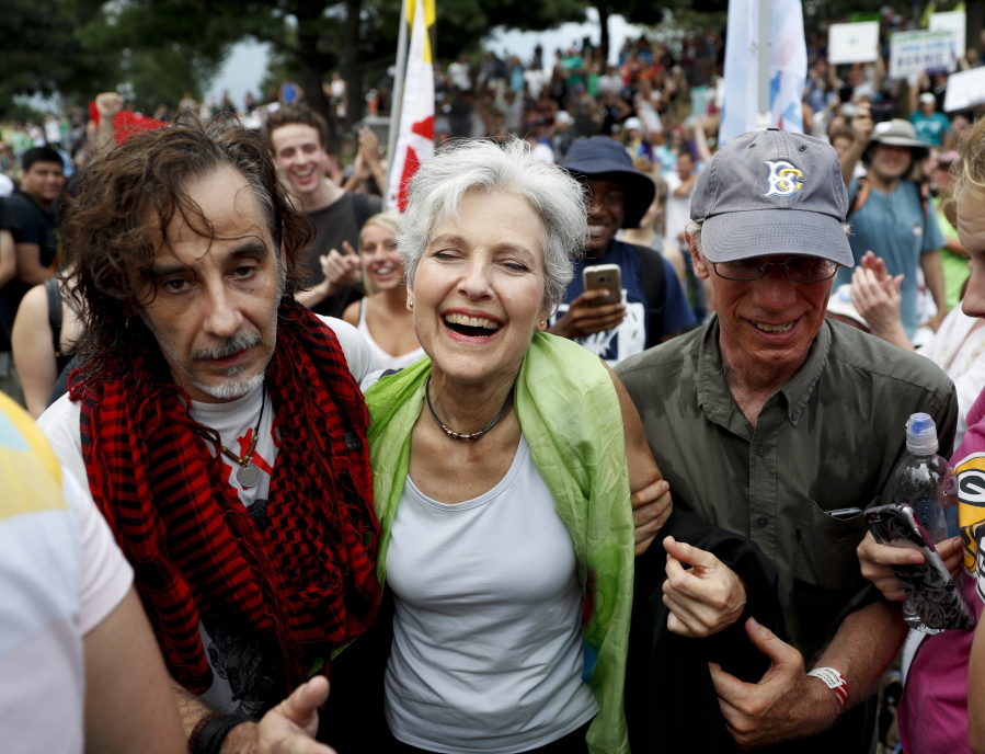 Dr. Jill Stein, presumptive Green Party presidential nominee, middle, arrives for a Power to the People Rally at Franklin Delano Roosevelt Park on Monday in Philadelphia, during the first day of the Democratic National Convention.