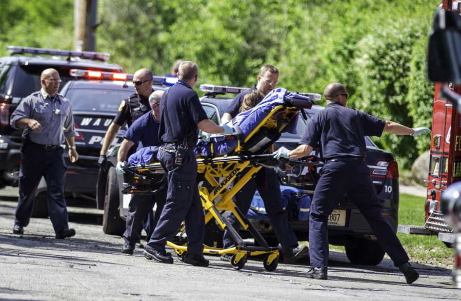 Rescue workers take 12-year-old stabbing victim Payton Leutner to an ambulance in Waukesha, Wis. in 2014. A Wisconsin state appeals court ruled July 27, 2016, that the two girls accused of trying to kill Leutner in an attempt to please the fictional horror character Slender Man should be tried as adults.