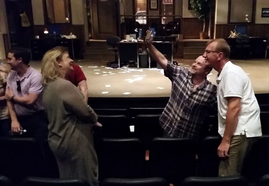 As Stacy Sells, second from left, looks on, Jason Alexander, second from right, takes a selfie with Tim Gauger after a preview show of &quot;Windfall&quot; at the Arkansas Repertory Theatre on June 5 in Little Rock, Ark. Alexander directed the play, which explores how people might react if they feel a co-worker is cheating them out of lottery jackpot money.