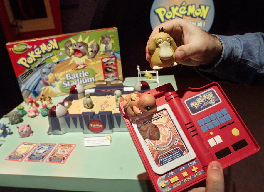 A Hasbro employee shows off components of the Pokemon Battle Stadium on Feb. 15, 2000, at the company&#039;s showroom in New York.