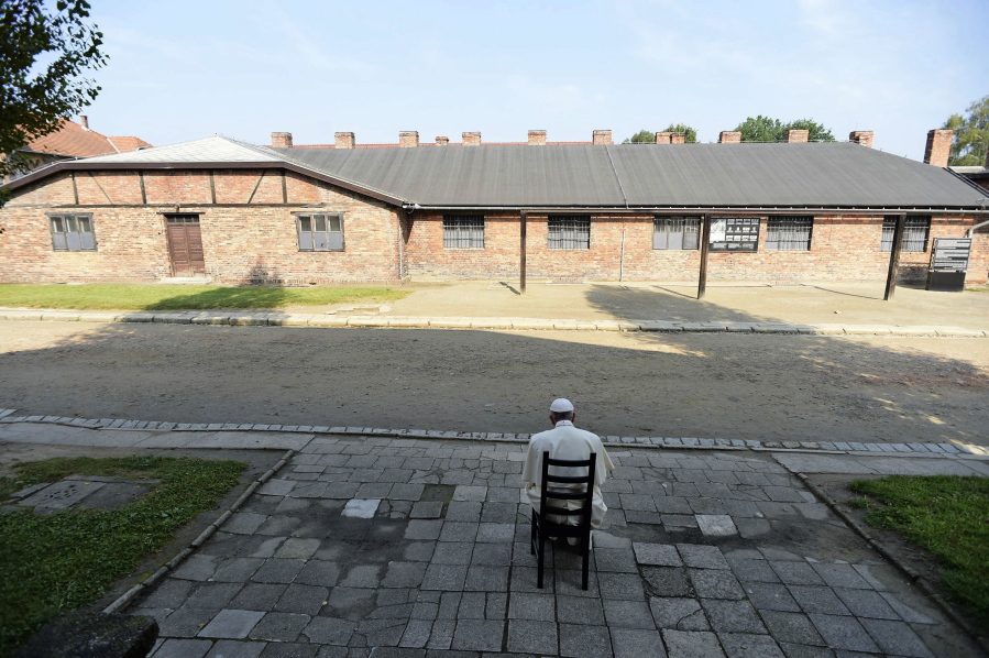 Pope Francis prays Friday during his visit to the former Nazi death camp at Auschwitz-Birkenau in Oswiecim, Poland.  He became the third consecutive pontiff to make the pilgrimage to the place where Adolf Hitler&#039;s forces killed more than 1 million people.