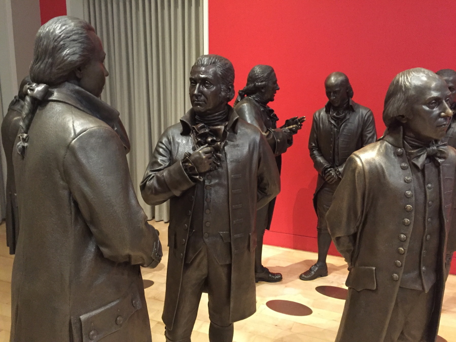 Life-size bronze sculptures of the signers of the U.S. Constitution in the Signers&#039; Hall at the National Constitution Center. The room is designed to give visitors a sense of what it was like for the Founding Fathers to huddle in a room debating and writing the famous document. (Photos by Beth J.