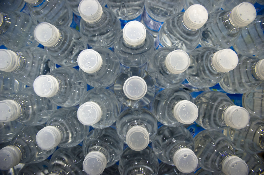Bottles of water move on the production line at the Nestle Waters Canada plant near Guelph, Ontario.