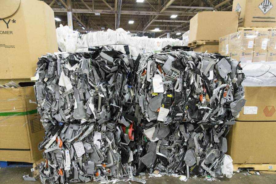 Bales of plastic stacked up in the Texas Recycling plant on July 27 in Dallas.