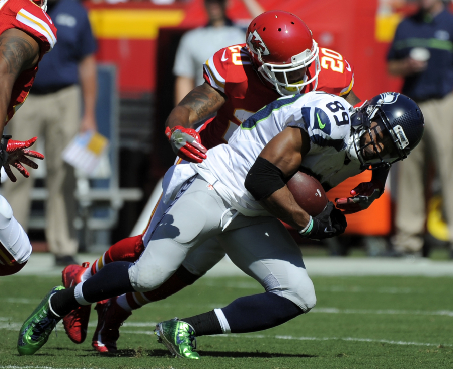 Seattle Seahawks wide receiver Doug Baldwin (89) is tackled by Kansas City Chiefs defensive back Steven Nelson (20) during the first half of an NFL preseason football game in Kansas City, Mo., Saturday, Aug. 13, 2016.