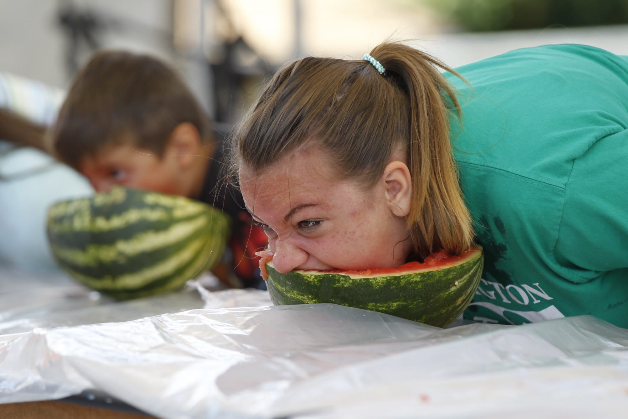 Danielle Gawronski, 14, of La Center competes in the watermelon eating contest at the Clark County Fair. Gawronski took third place.
