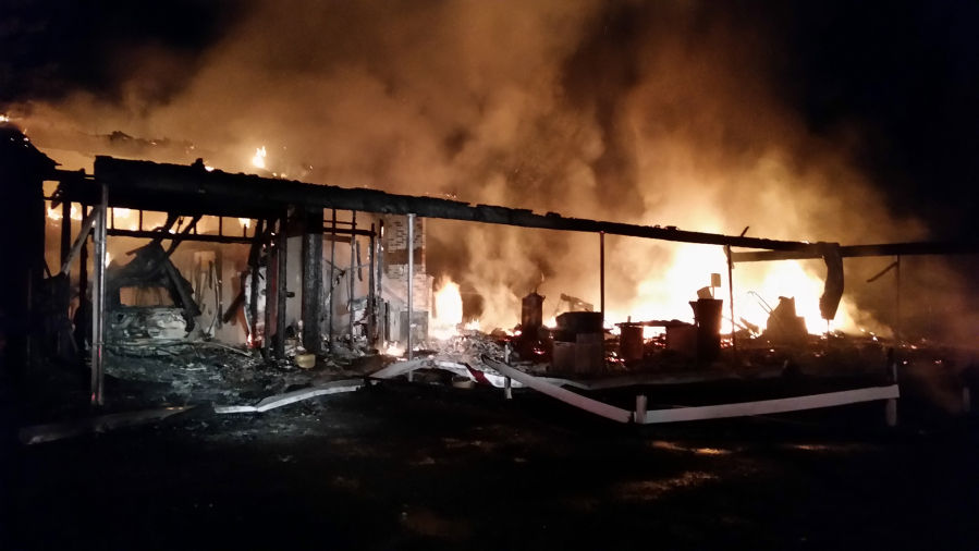 A house east of Washougal was destroyed in a blaze Friday night. Firefighters used a water tender to haul in water to douse the fire, which took crews hours to contain.