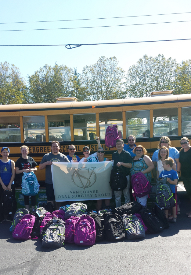 Esther Short: Employees of the Vancouver Oral Surgery Group, which donated more than 250 backpacks filled with school supplies to students throughout Clark County.