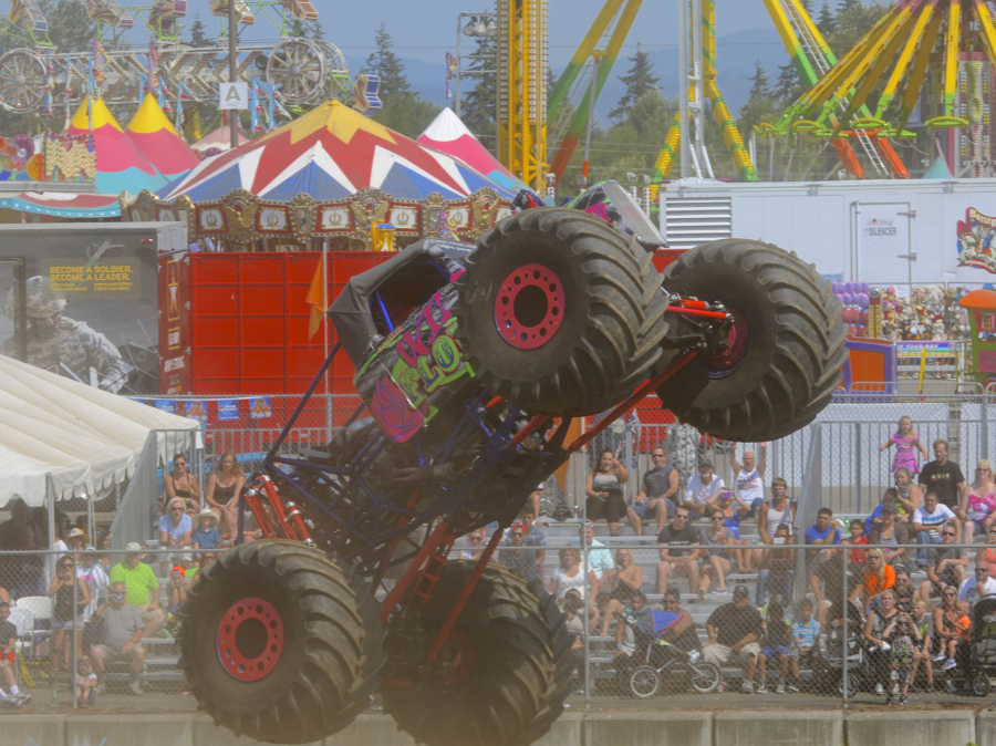 The Wild Orchid monster truck performs for the crowd on the final day of the Clark County Fair in 2014.