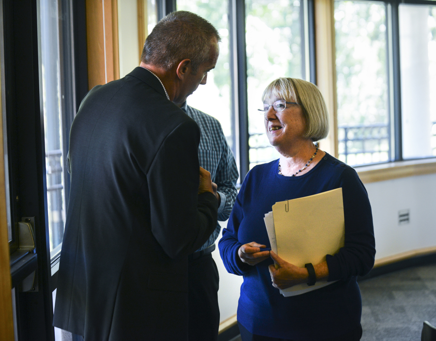 Sen. Patty Murray speaks to David Ripp, the executive director of the Port of Camas-Washougal, following a Columbia River Economic Development Council luncheon on Tuesday. The Democratic senator spoke about her collaborative efforts in &quot;the other Washington&quot; before a crowd of more than 90 local business leaders.