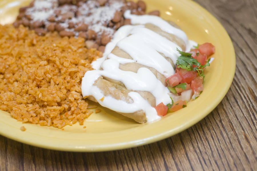 Sabor Mexicano&#039;s homemade tamale plate is served July 30 at the restaurant in Vancouver&#039;s Uptown Village area. The business started out selling tamales at the Vancouver Farmers Market.