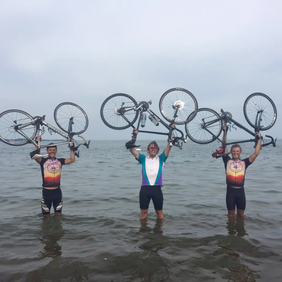 Ridgefield: Nigel Hall, from left, Josh Bean and Matt Gaylor, a Skyview High School graduate, in the Atlantic Ocean in Boston after concluding a bike ride across the country where they raised more than $24,000 for young people dealing with cancer.