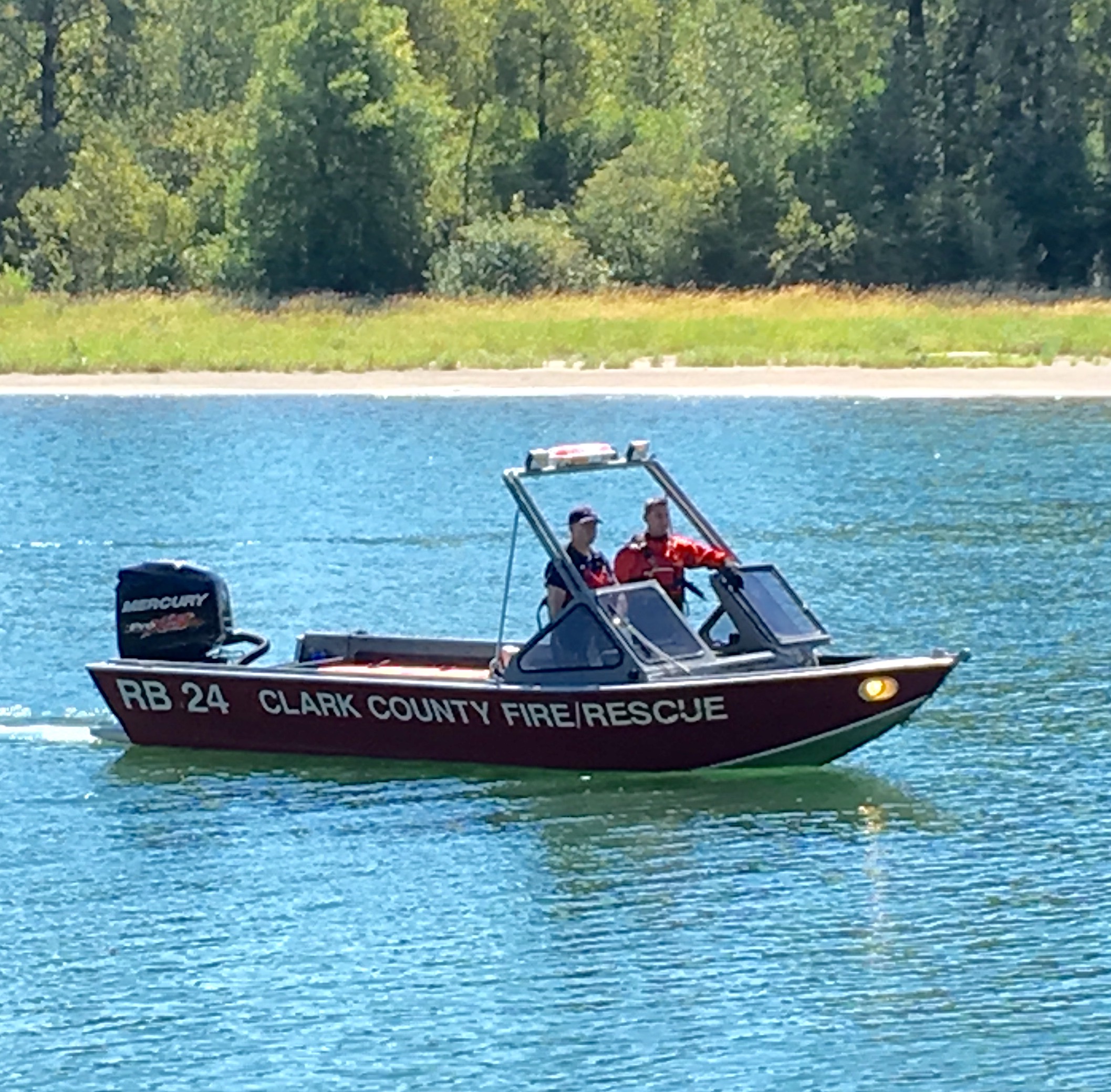 Clark County Fire & Rescue responds to a call about a body found in the Lewis River Friday morning. Officials recovered an elderly woman's body, and the Cowlitz County coroner and sheriff's office are investigating.