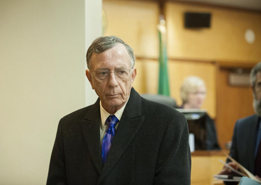 Amanda Cowan/The Columbian
Former Superior Court Judge John Wulle is arraigned on a charge of driving under the influence Wednesday morning in Clark County District Court.