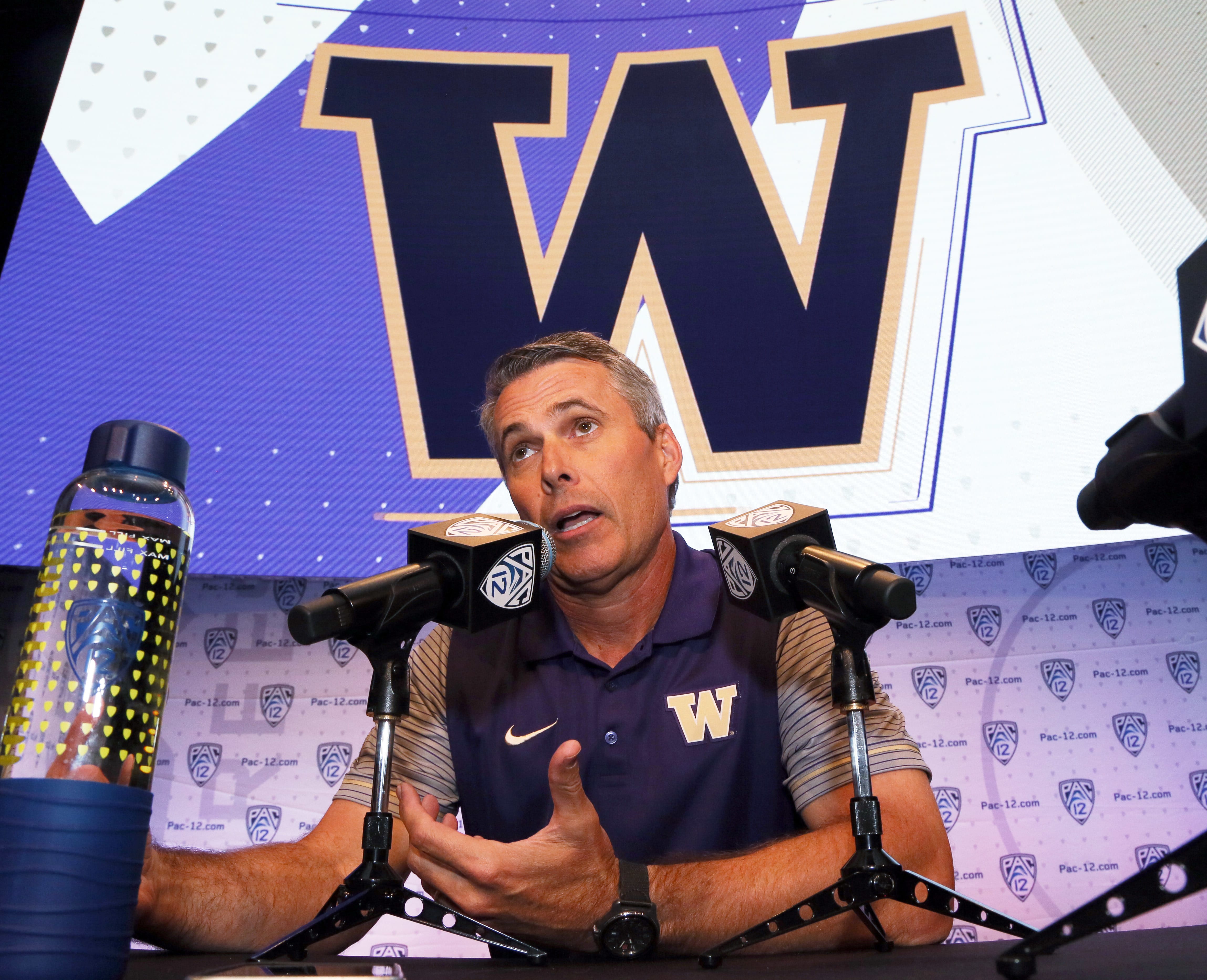 Washington head coach Chris Petersen speaks at the Pac-12 NCAA college football media day in Los Angeles on Friday, July 15, 2016.